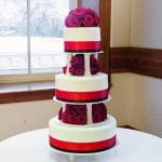 super tall red roses wedding cake
