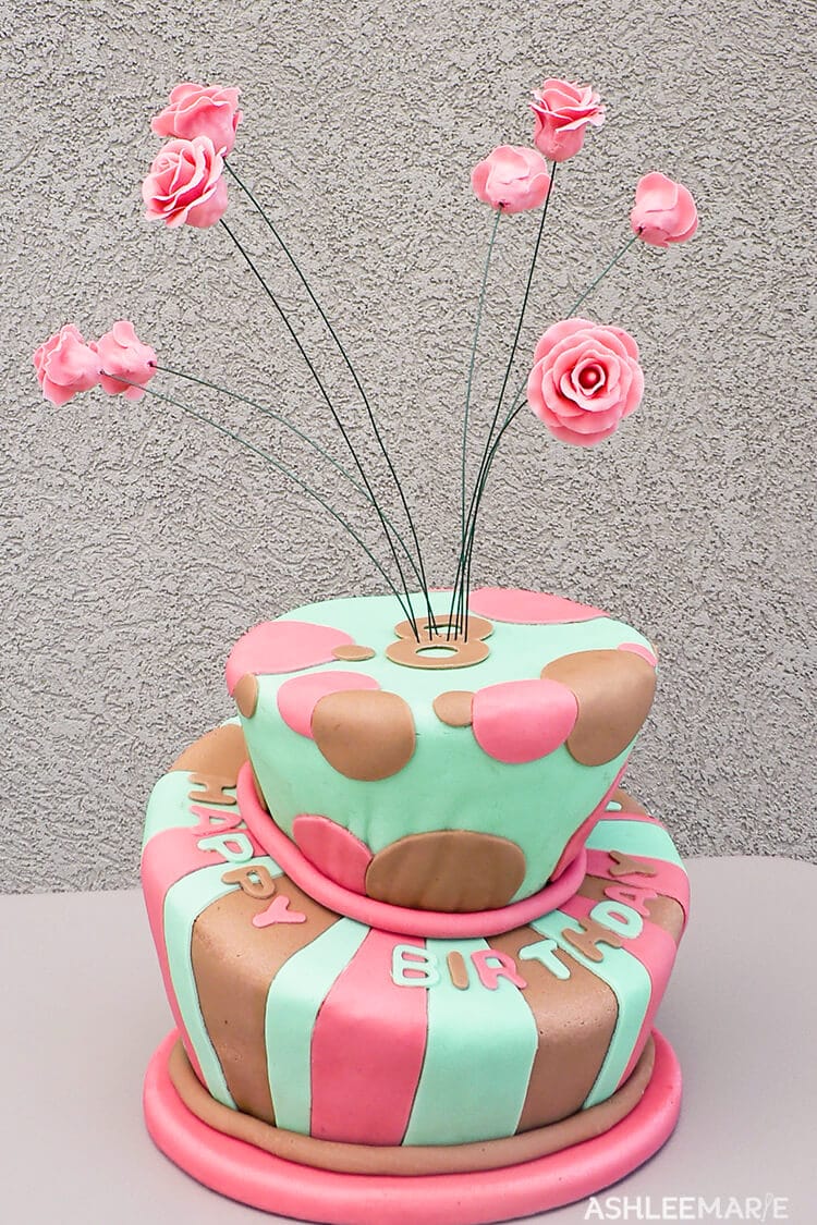 topsy turvy birthday cake with roses
