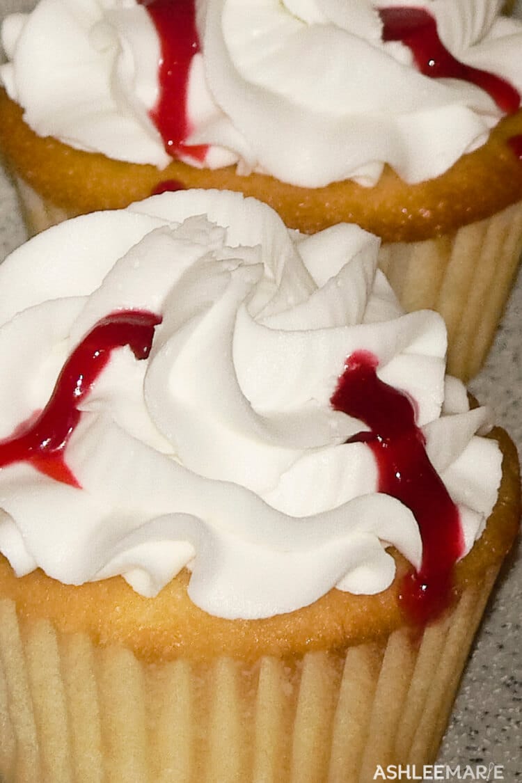 vampire bite cupcake with berry blood