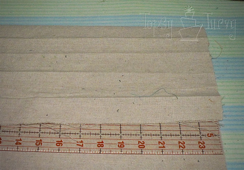 101209_194411-editpainters drop cloth stripped triangle pillow ironing