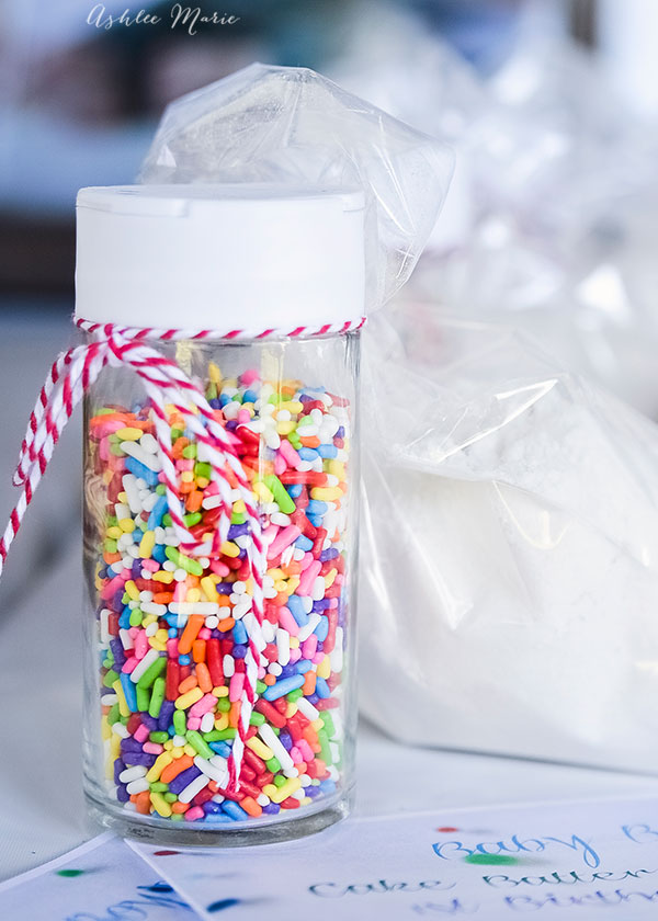 container of sprinkles and a bag of cake mix make the perfect favors