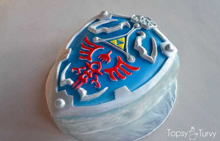 Legend of Zelda Hylian Shield sweet 16 birthday cake - Ashlee Marie - real fun with real food