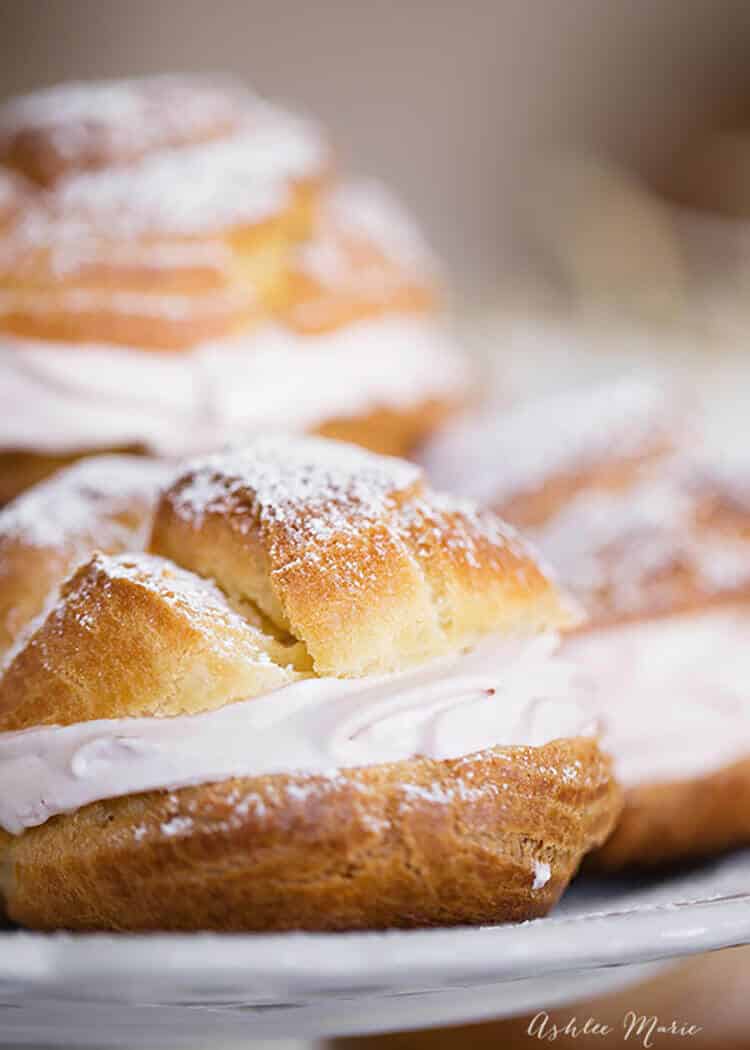 Raspberry whipped cream is a wonderful filling for this homemade cream puffs, recipe and video tutorial