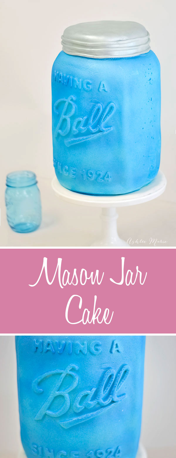 a mason jar cake - hand carved, covered in fondant with hand cut details and airbrushed to be vintage mason jar blue