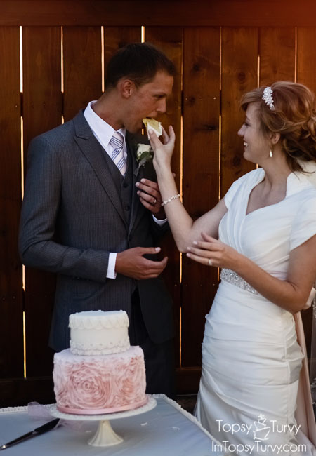 fondant-ruffled-rosette-wedding-cake-cutting