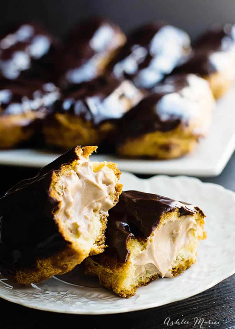 chocolate pastry cream filled eclairs topped with a rich ganache icing, easy to make and delicious