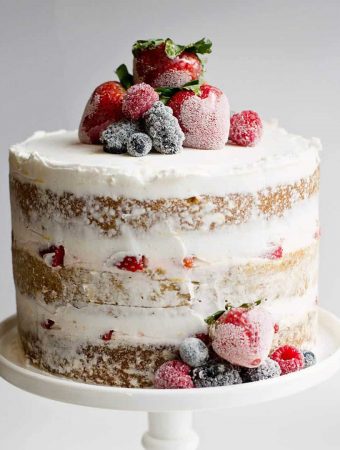 Vanilla bean cake, lemon buttercream with candied and sugared berries makes for a gorgeous cake