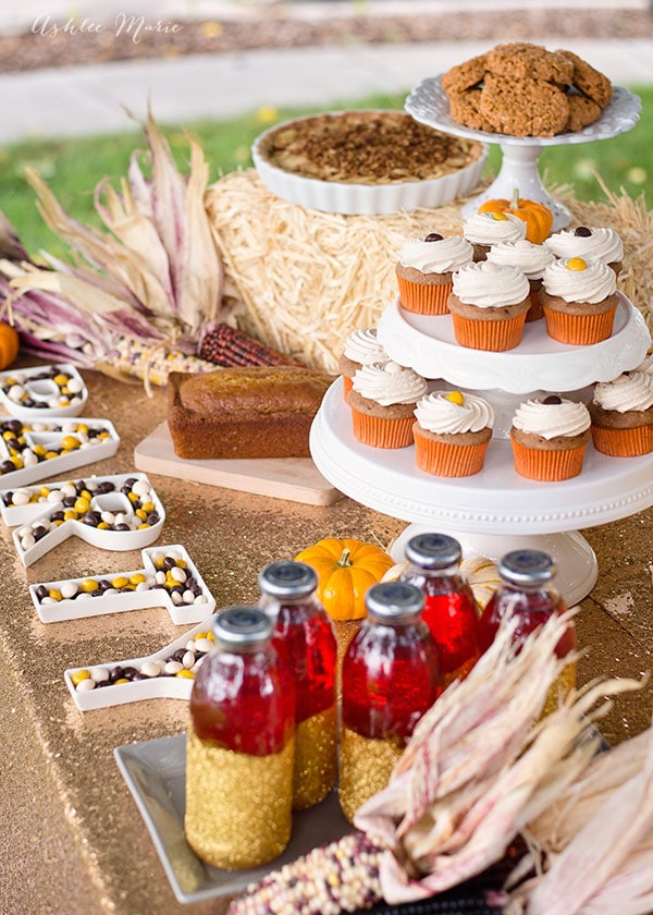 Add height to your party table with hay bales and cake stands. That way everyone can see all the food AND it looks much better straight on.