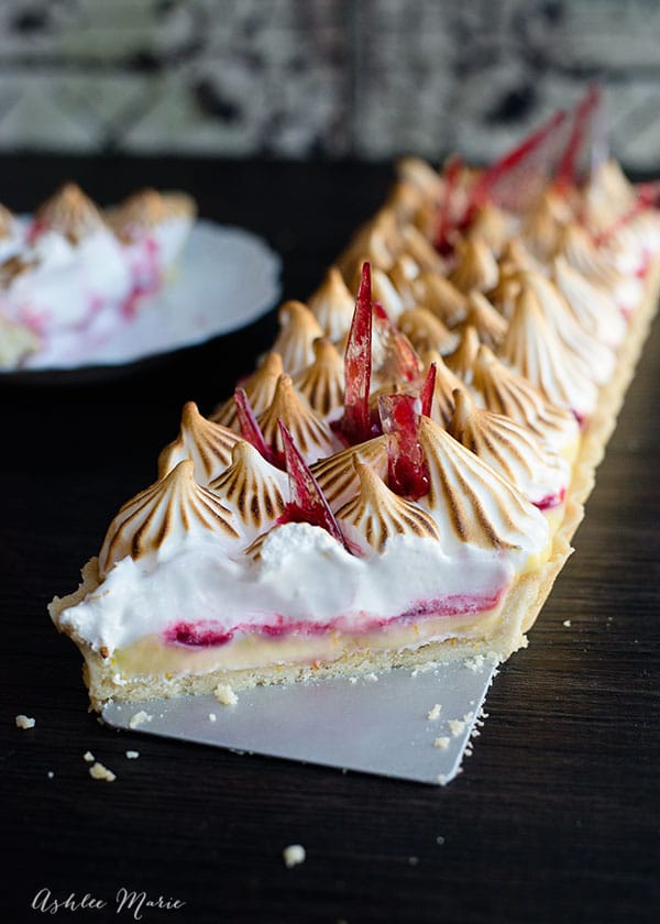 the layers in this tart are amazing, a slightly sweet crust with an amazing crunch, a tart creamy citrus filling, berry coulis and topped with a torched marshmallow frosting