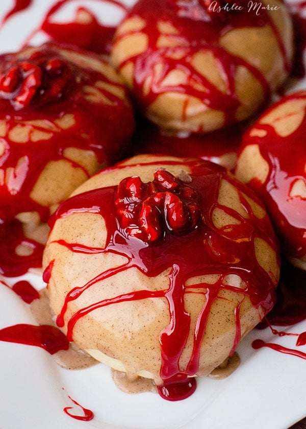 everyone loves a little blood on halloween right? these bloody brain doughnuts look fantastic and are delicious, caramel, cinnamon and apple doughnut with a toasted walnut brain