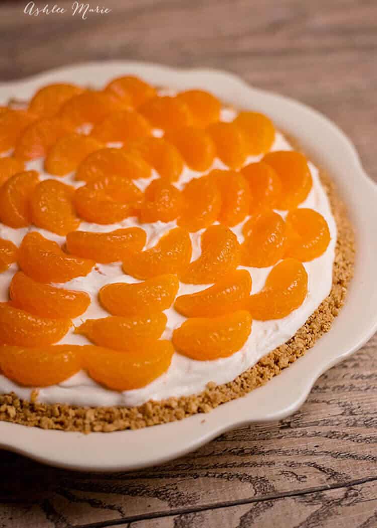 There are sweet mandarin oranges inside this no bake cheesecake as well as on top, it is a sweet treat that everyone loves