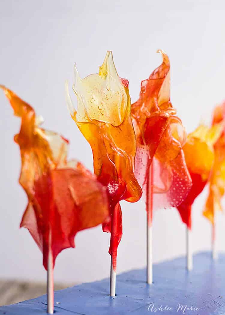 make homemade cinnmon suckers look like flames to represent fire or anger at your party