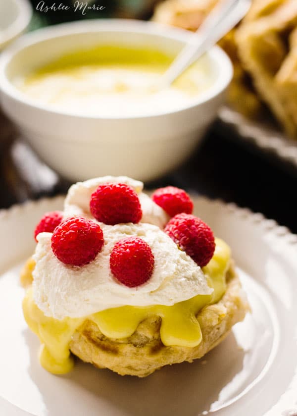 sweet and crunchy and warm, liege waffles are pretty much perfection. Top with this tart homemade lemon curd, whipped cream and raspberries and it is seriously one of the best things you will ever eat