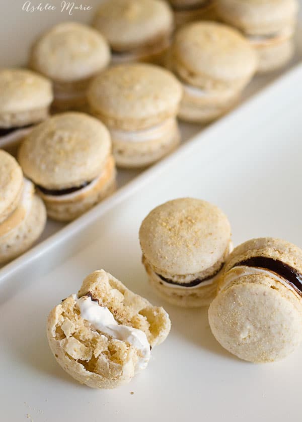 it doesnt get much better than smore macarons, graham cracker flavored macaron shells filled with chocolate ganache and marshmallow frosting