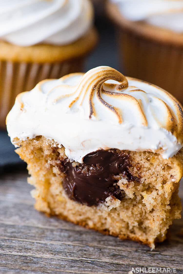 chocolate ganache filled graham cracker cupcake topped with homemade marshmallow frosting - s'mores cupcakes