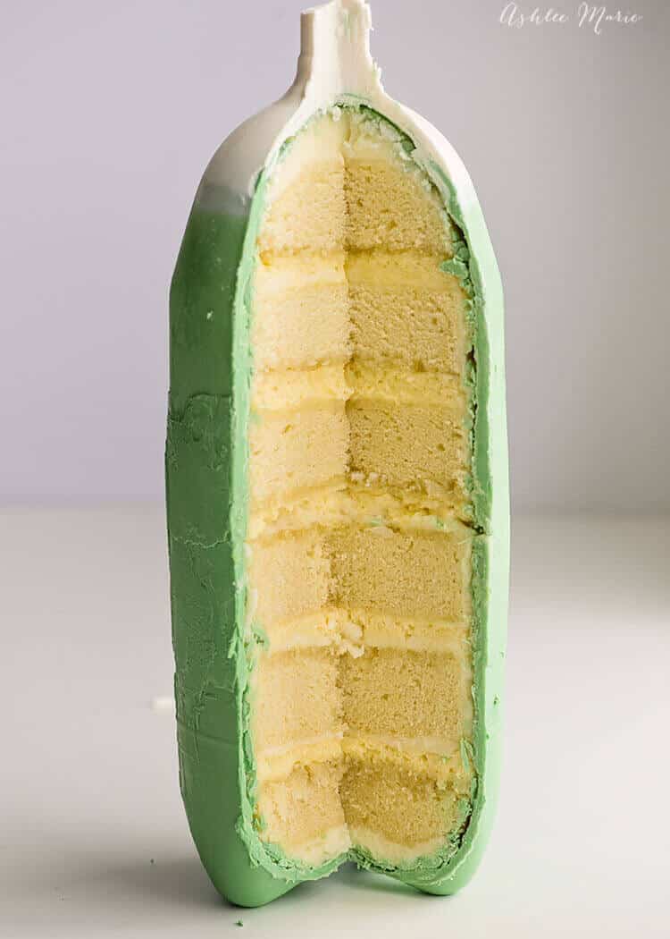 the outside of the soda bottle cake is chocolate and the inside is layers of frosting, cake and mousse - all soda flavored!